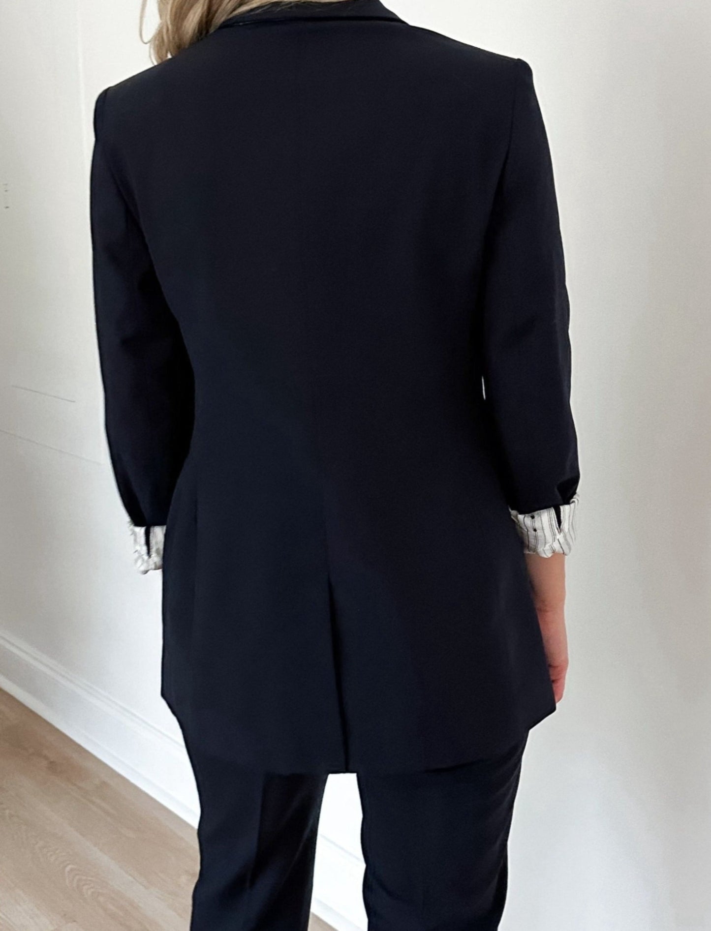Back view of women's navy blazer #color_Navy